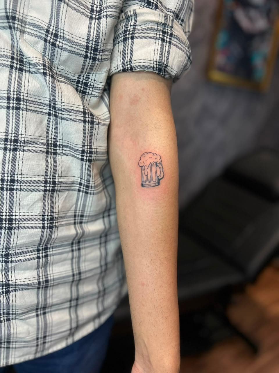 Small fine-line tattoo with clean linework, Lotus Tattoo Studio Gurugram