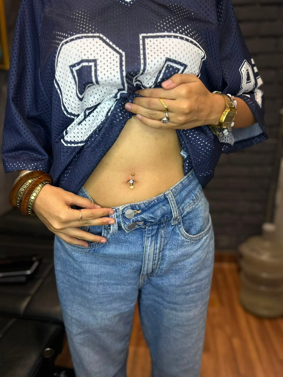 Multiple ear piercings with decorative jewellery, Lotus Tattoo Studio Gurugram