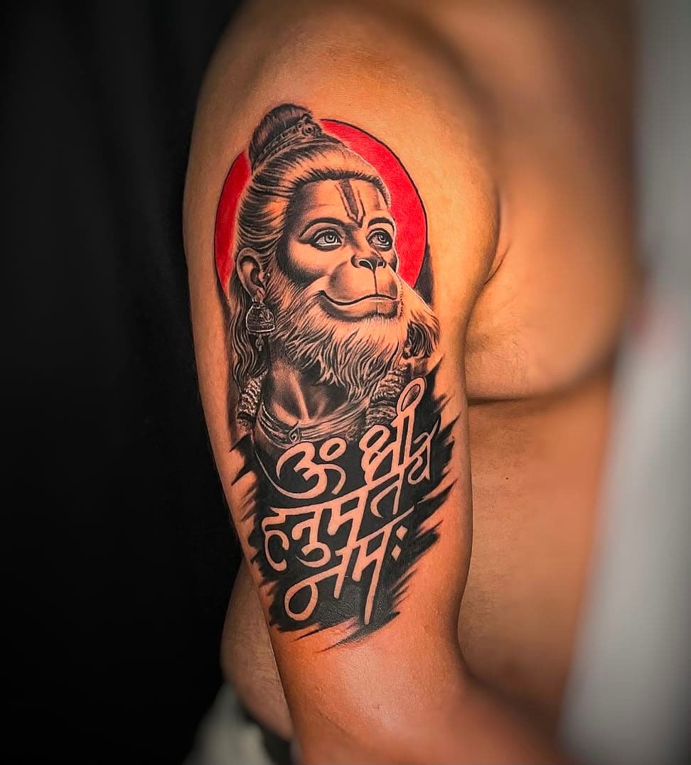 Hanuman deity tattoo with red halo and Sanskrit script, Lotus Tattoo Studio Gurugram