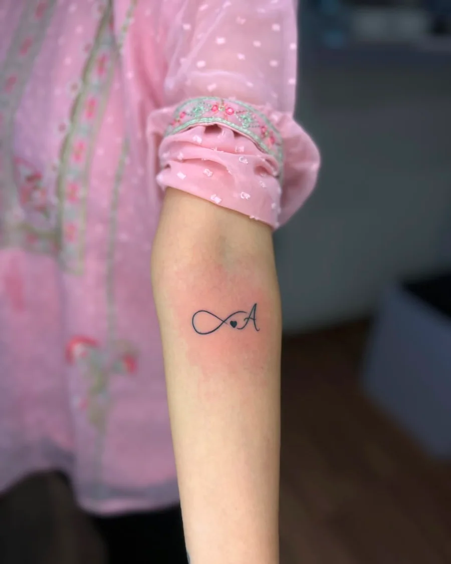 Small black ink tattoo artwork